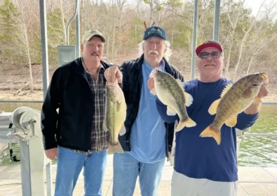 Group of anglers with bass caught on a fishing trip in Branson